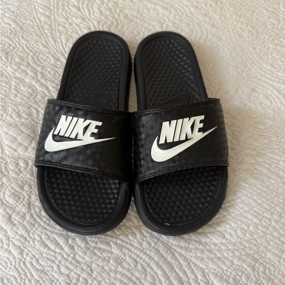 Nike Black Slip-On Slides with White Swoosh Detail